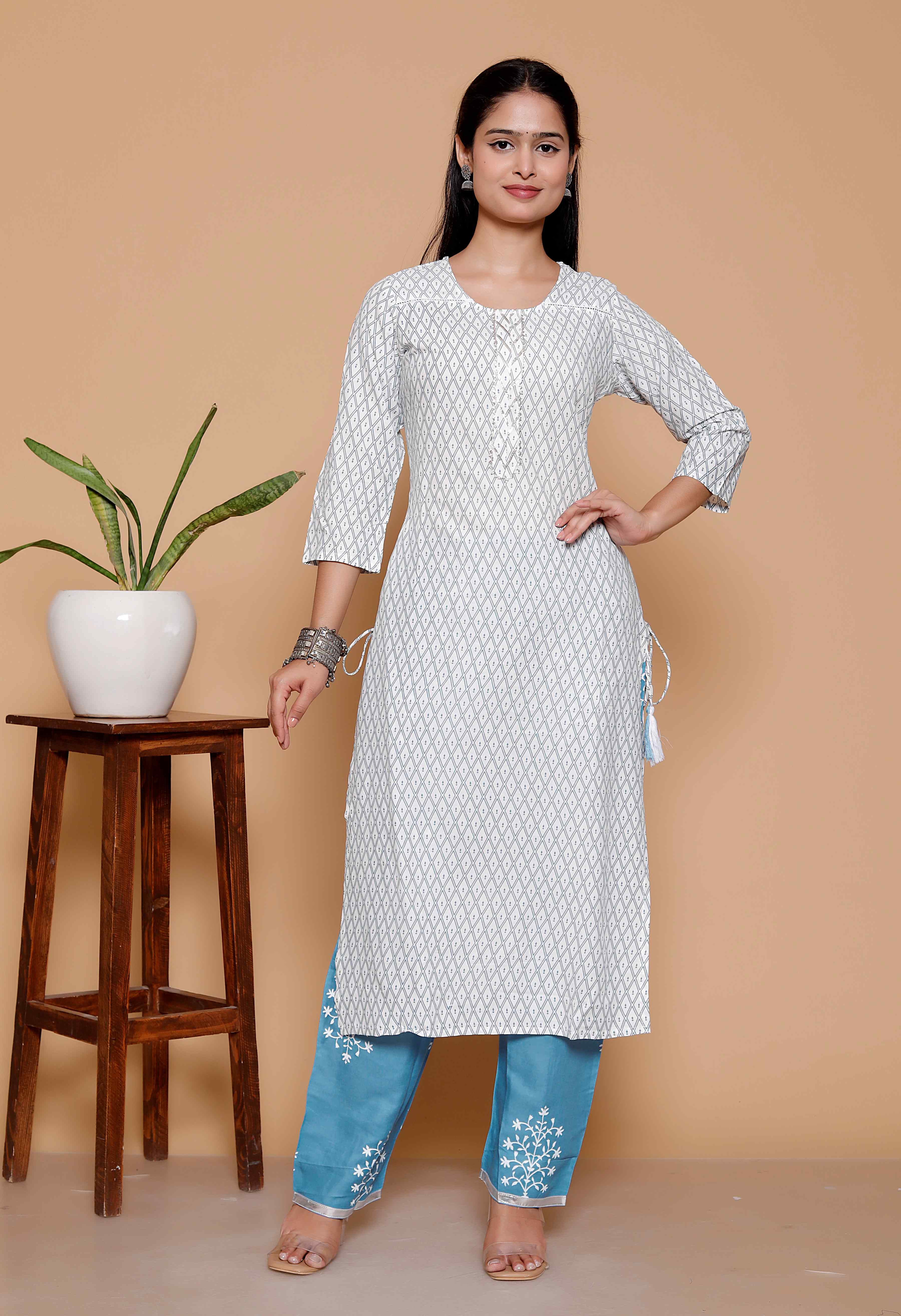 AAVARI Women’s White Printed Kurta Palazzo Set with Embroidered Blue Palazzo