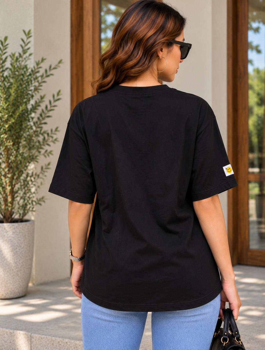 AAVARI Women's Black Oversized Smiley Face Graphic T-Shirt